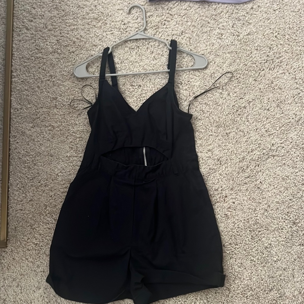 Black denim cut out romper from urban outfitters
